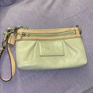 COACH poppy sparkly cream and pink wristlet